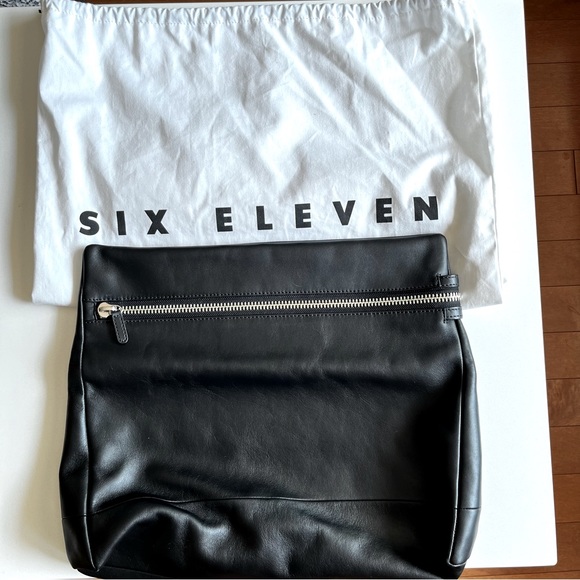 Auxiliary Handbags - Six Eleven by Aritzia black leather clutch / pouch